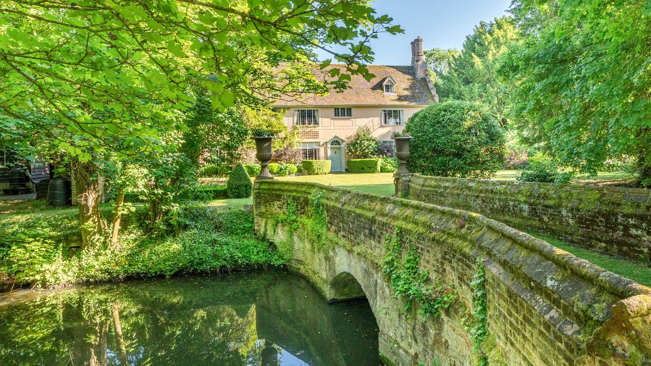 an-ancient-manor-where-a-millennium-of-history-and-a-medieval-moat-meet-a-swimming-pool-and-party-barn